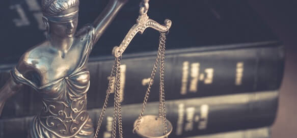 legal books and law scales of Justice