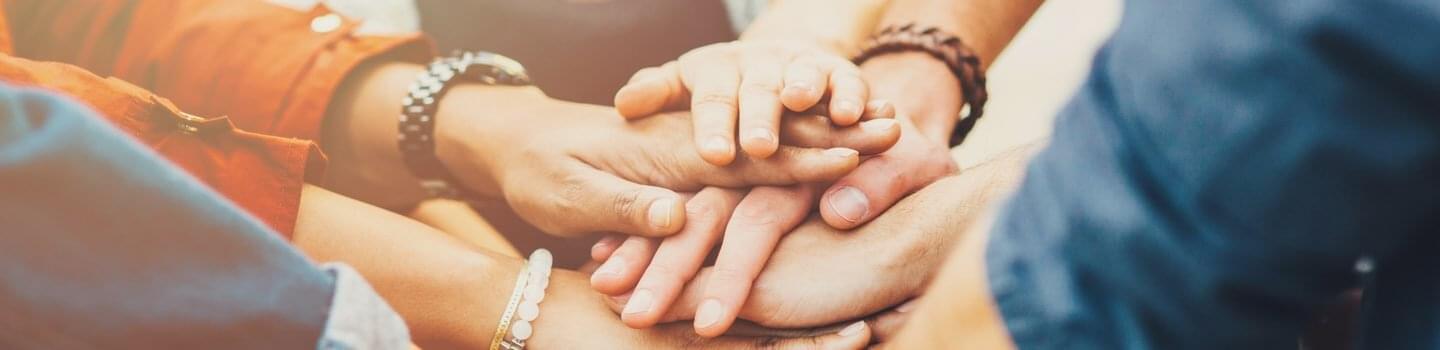 Support group with hands extended