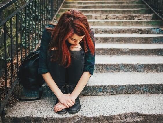 Teenage girl on stairs