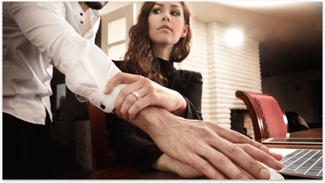 Woman being bullied in her office by her superior