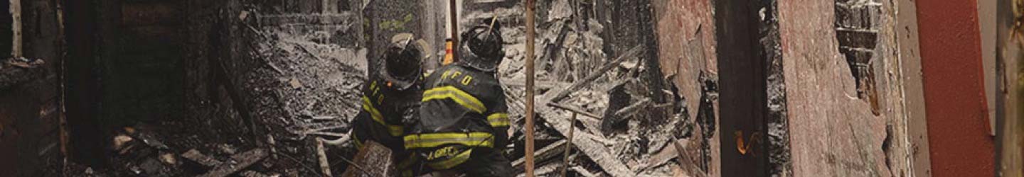 firefighters in a collapesed building