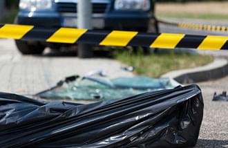 body bag at the scene of a car accident