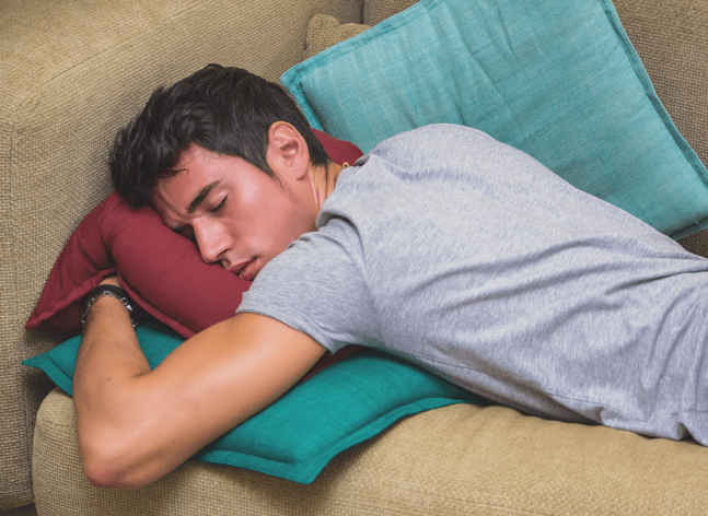 Homeless college student sleeping on friend's couch