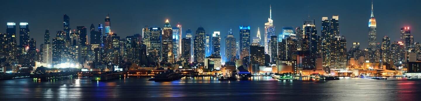 View of New York City buildings at night