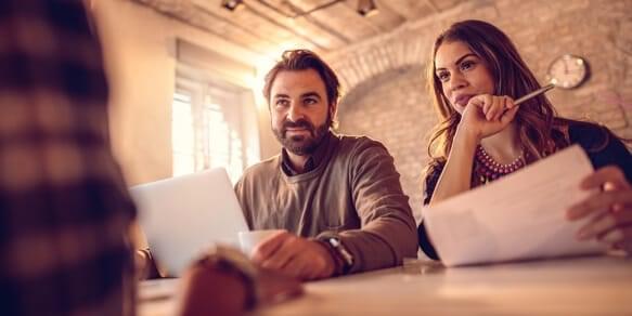 Couple being counseled over paperwork