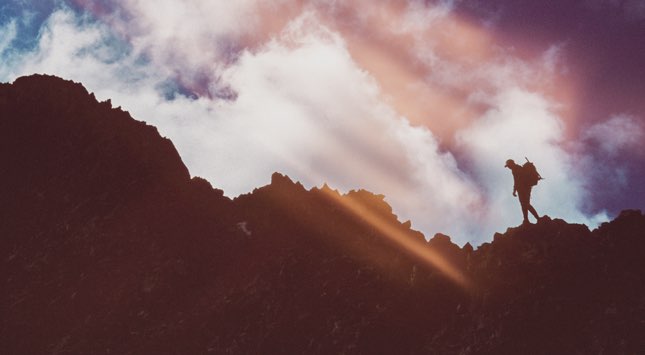 man hiking in the mountains