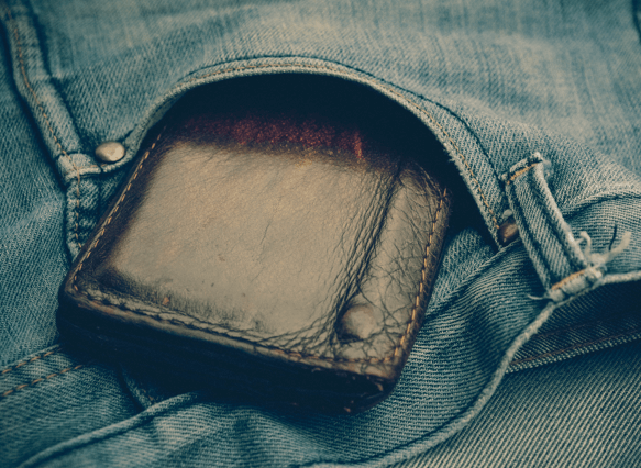 Wallet in jeans pocket