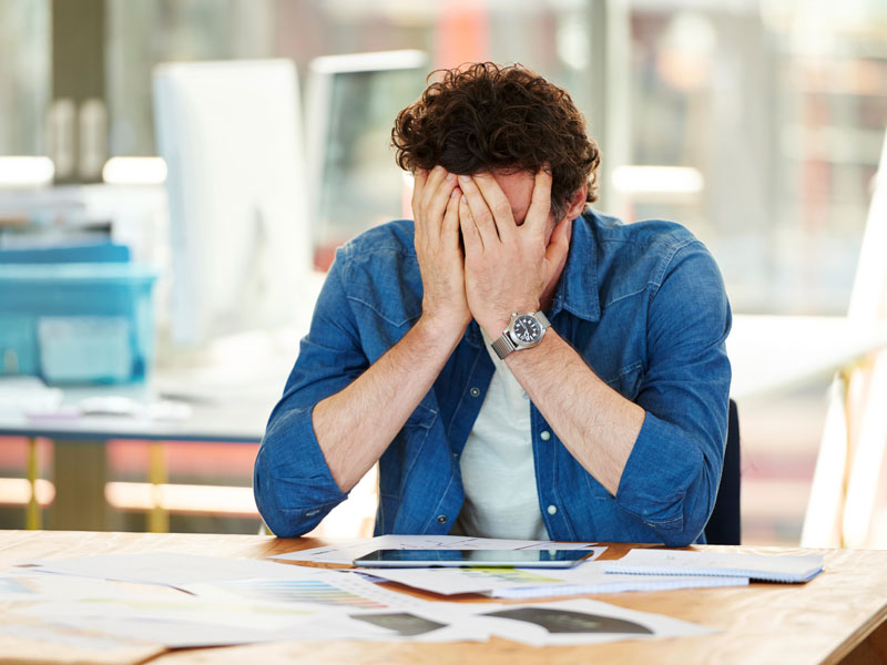 Young man dealing with stress.