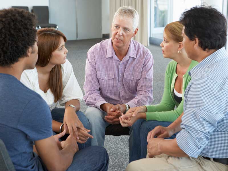 Members talking in a circle