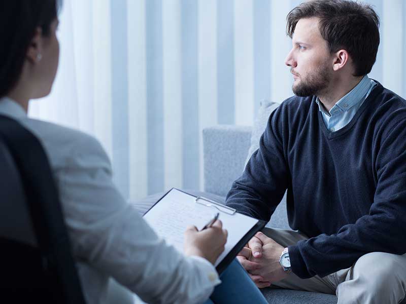 Young man during psychological therapy