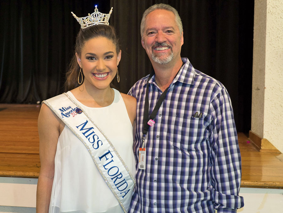 Miss Florida with a teacher at Winter Park High School