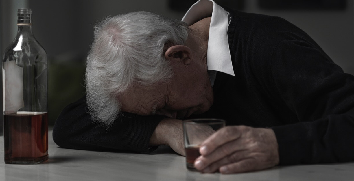 older male with liquor