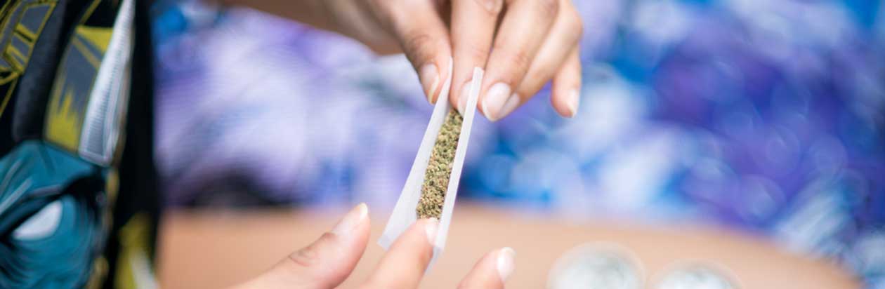 Weed being rolled into a joint