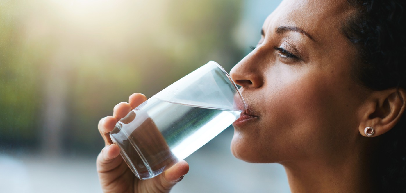 Woman drinking a glass of water